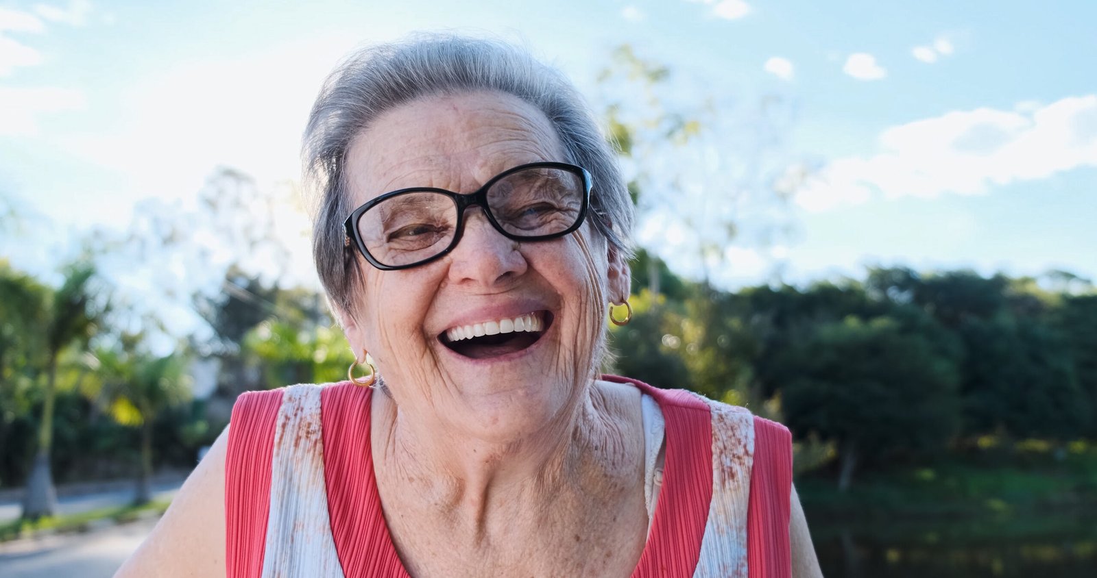 Smiling old Latin woman Image description